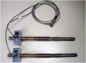 Transmission shafts with eddy current hardness test coils to inspect for proper case depth