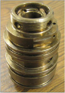 Fuel injector housing to be eddy current tested by a manufacturer of diesel engines